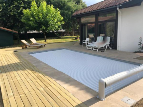 Maison landaise moderne piscine chauffée spa